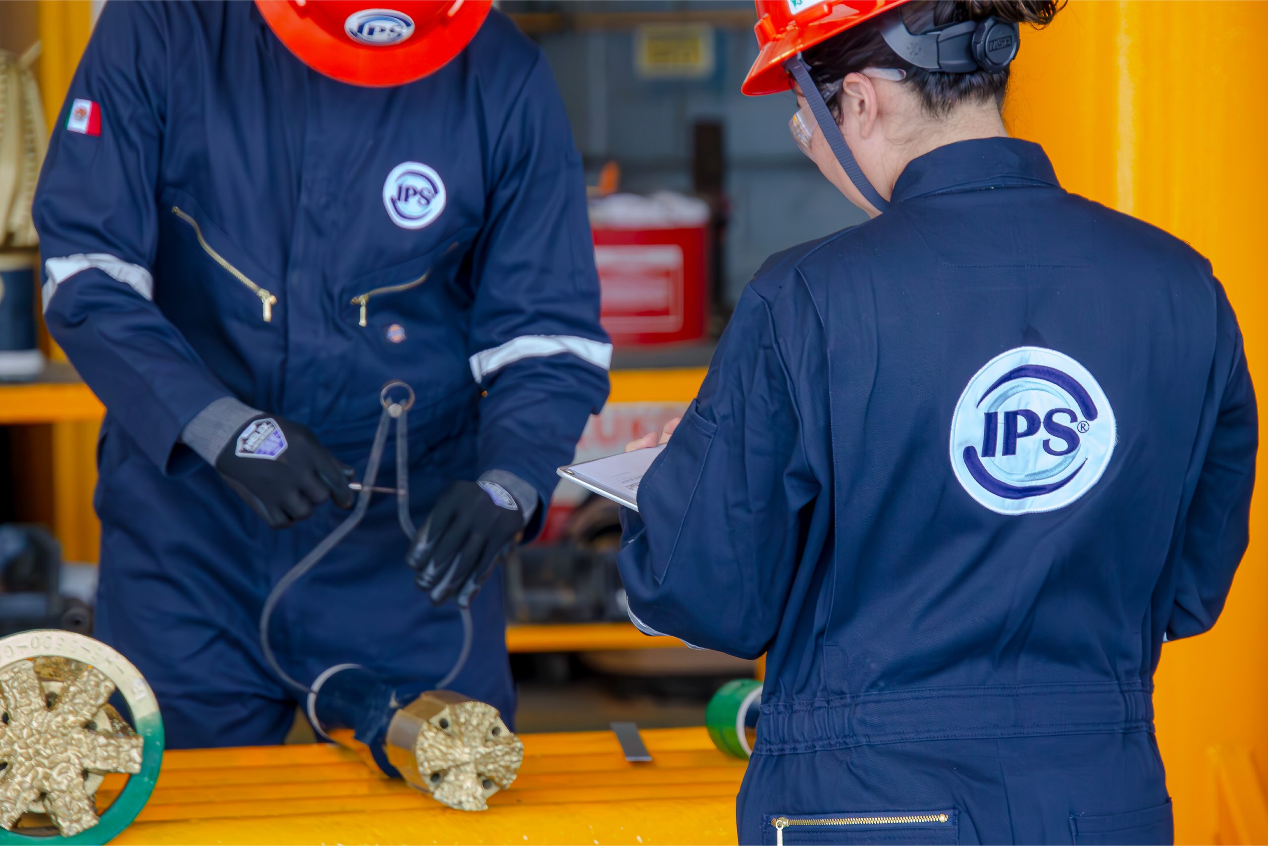 Grupo IPS technician seen from behind in the workshop