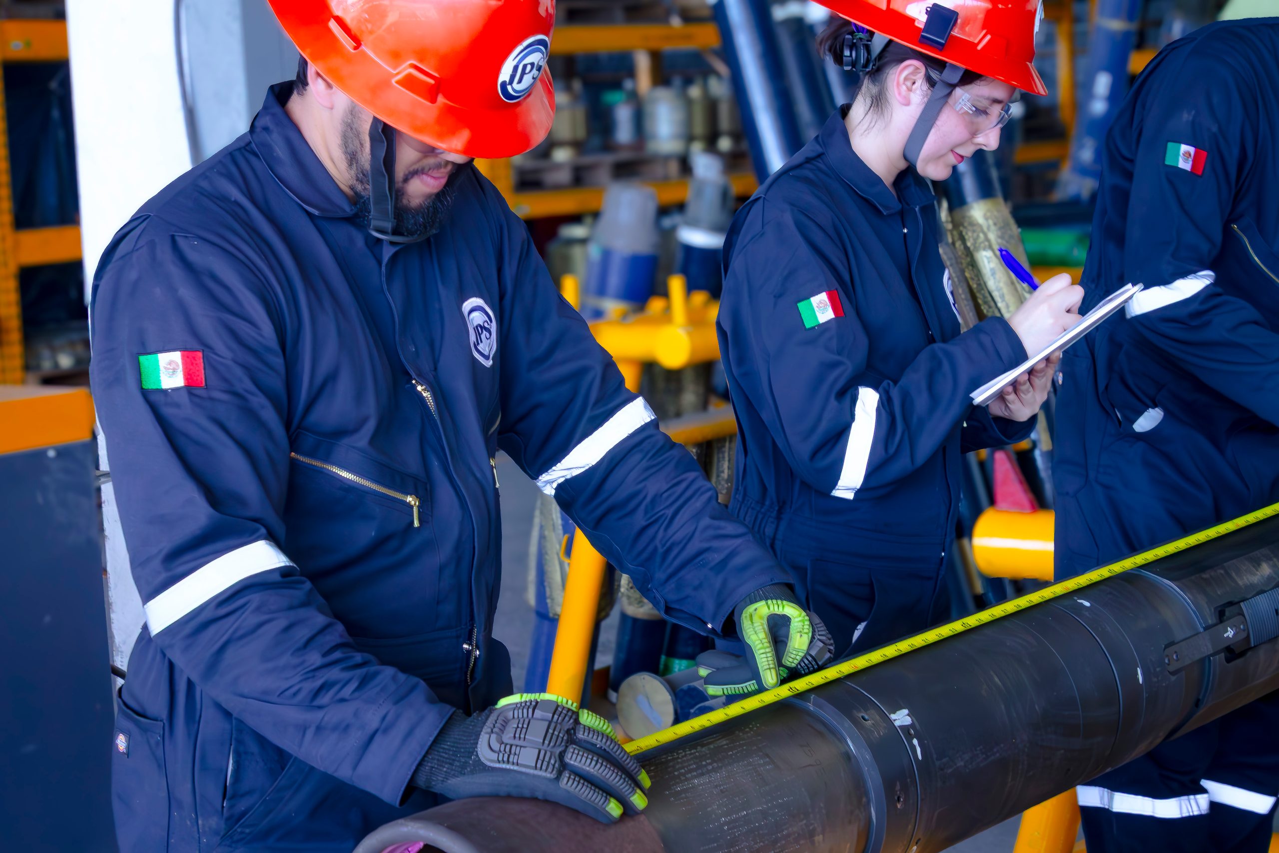 Technicians reviewing drilling data