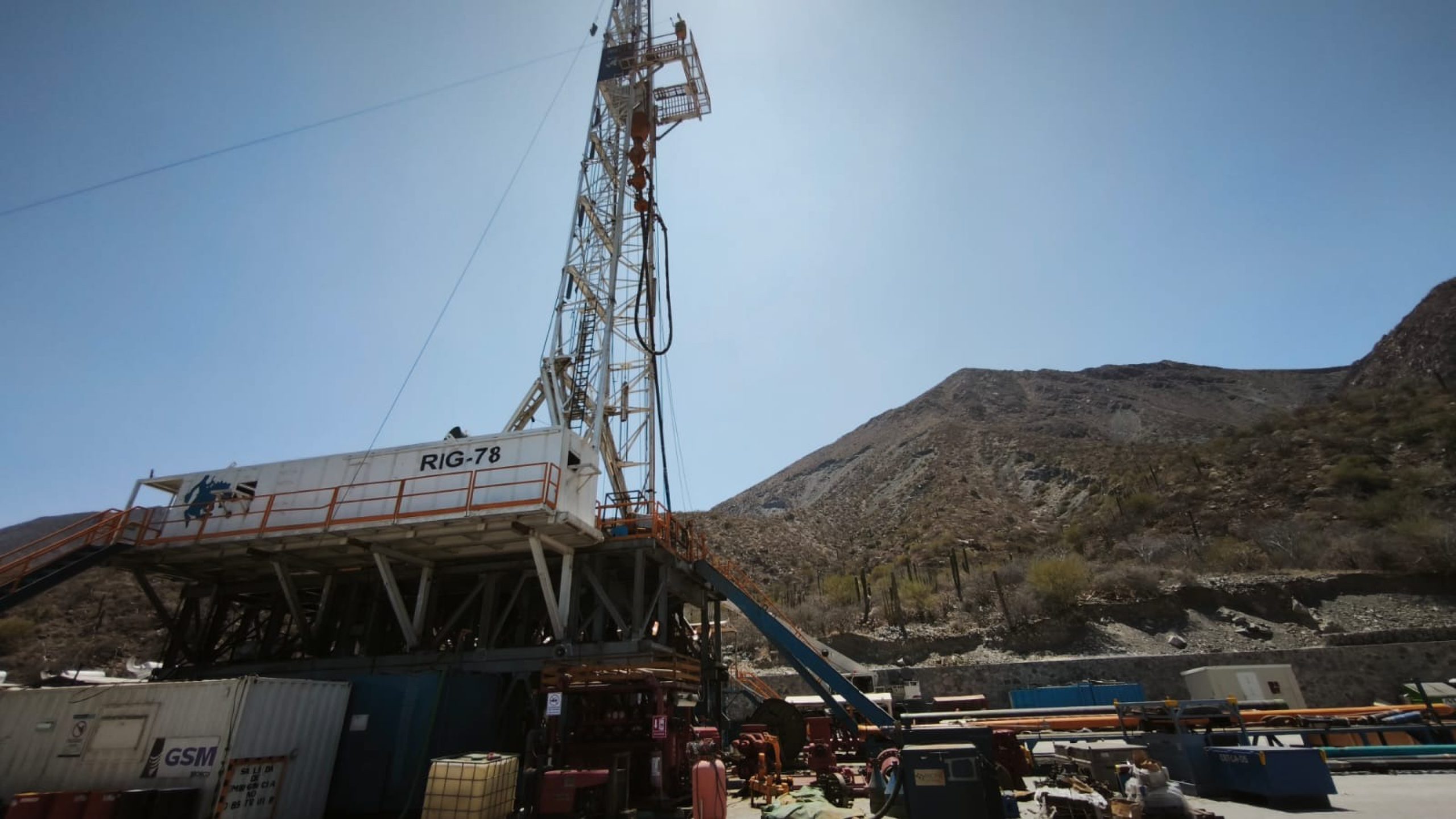 Drilling rig at a geothermal site on a volcanic hillside
