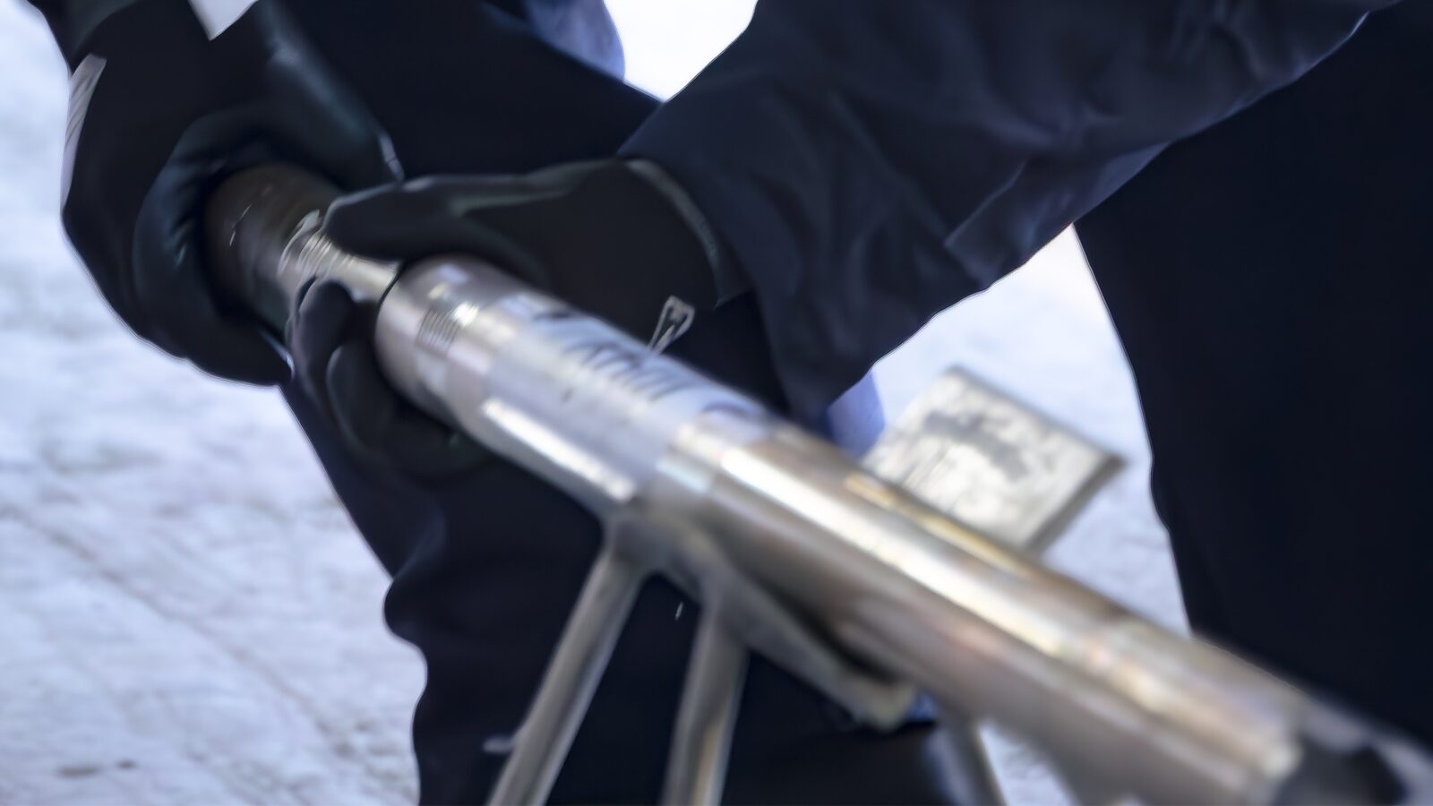 Technicians handling an IMAS MWD tool