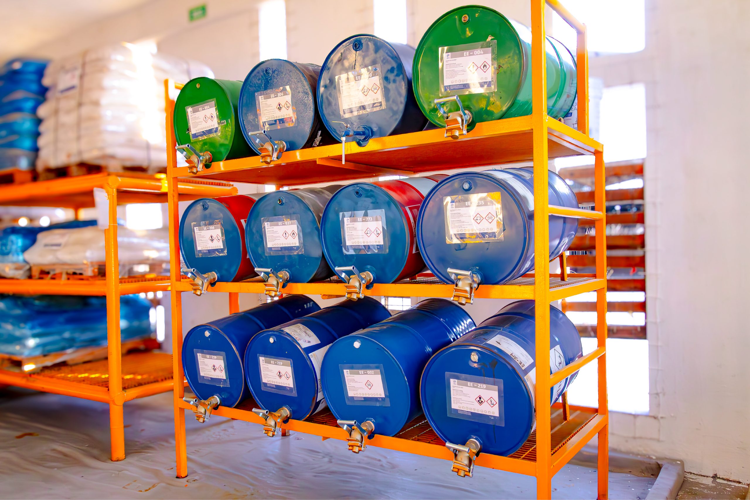 Chemical drums stored on a rack